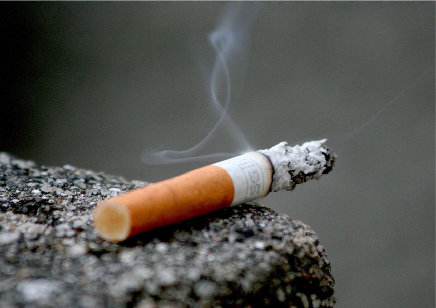 image of a burnt out cigarette on a wall 